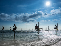 Pêcheur sur échasse